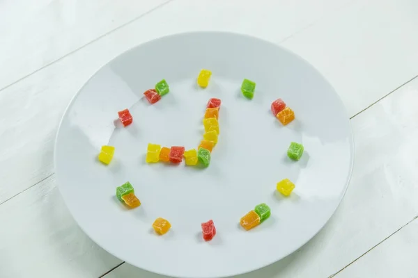 Hedelmät kello sokeroitu hedelmät — kuvapankkivalokuva