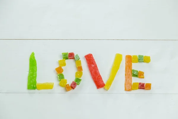 Kjærlighetsord med kandiserte frukter – stockfoto