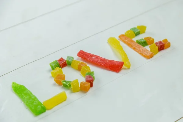 Love word with candied fruits — Stock Photo, Image