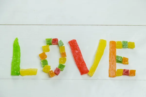 Palabra de amor con frutas confitadas —  Fotos de Stock