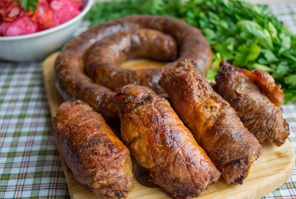Meat rolls and pork sausage. Easter dish — Stock Photo, Image
