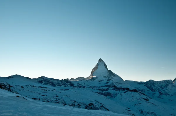 Kış günbatımı görünümü'karlı Matterhorn, Zermatt, İsviçre