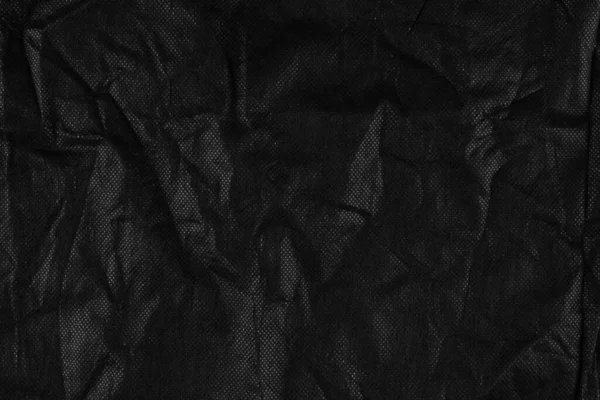 Background Black Crumpled Sheet Fabric Vignetting — Stock Photo, Image