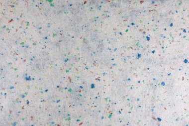 El yapımı kağıt doku arkaplanının yakınlaştırılması. Geri dönüştürülmüş kağıt