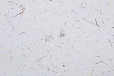 El yapımı kağıt doku arkaplanının yakınlaştırılması. Geri dönüştürülmüş kağıt