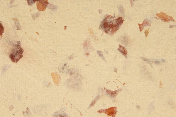 Closeup of handmade paper texture background. Recycled paper