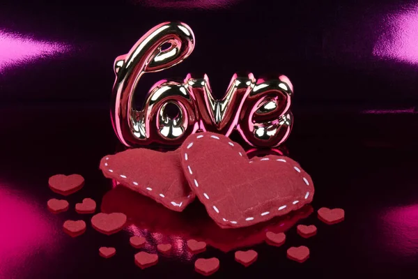 Love text, golden letters with Valentine\'s day concept.