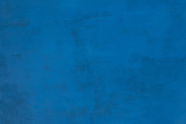 Eski mavi boyalı, duvar desenli bir arka plan