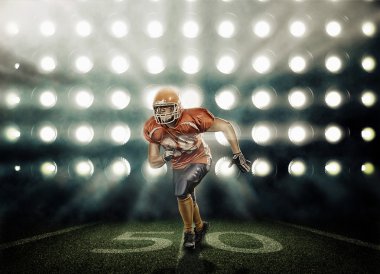 Spot arka plan üzerinde profesyonel Amerikan futbolu oyuncusu