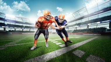 Amerikan futbol oyuncuları yeşil çimenlerin üzerinde
