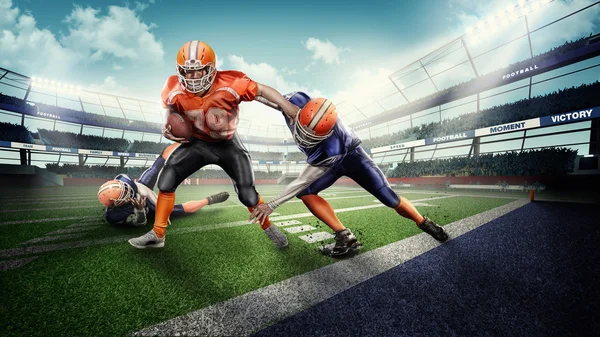 Caucasion american football players in the action on stadium — Stock Photo, Image