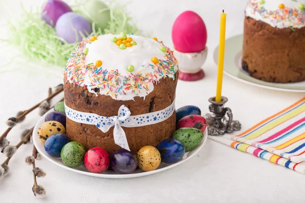 Russian easter cakes Kulich with dyed quail eggs