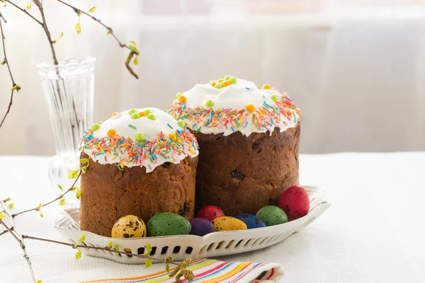 Russian easter cakes Kulich with dyed quail eggs
