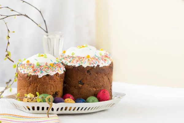 Russian easter cakes Kulich with dyed quail eggs