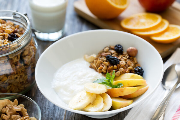Healthy breakfast bowl with yogurt and granola. 
