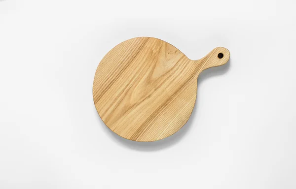 A wooden cutting board on a white background — Stock Photo, Image