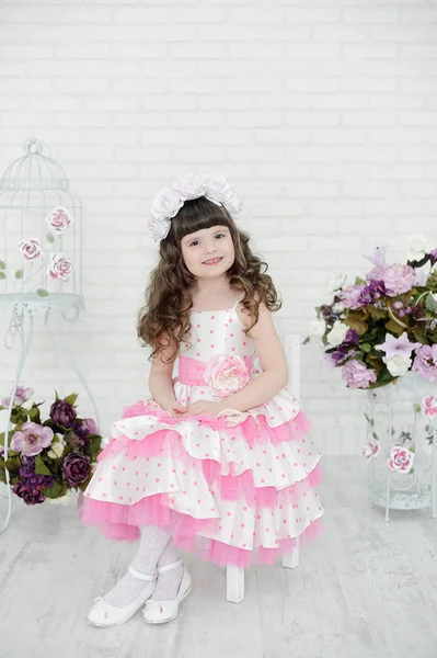 Little girl and flower — Stock Photo, Image