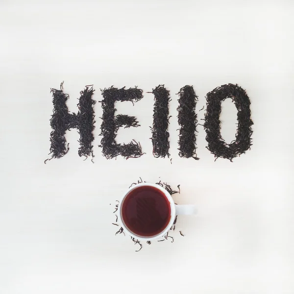 Word hello és a csésze tea — Stock Fotó