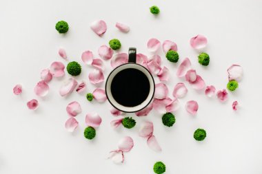 Coffee cup in rose petals clipart
