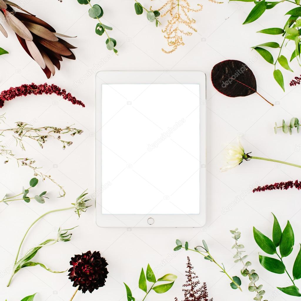 Tablet in floral frame