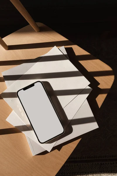 stock-photo-flatlay-blank-screen-mobile-phone