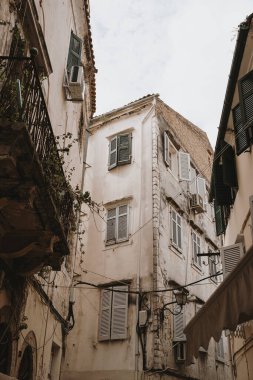 Narrow Alleyway with Historic Buildings in Greece