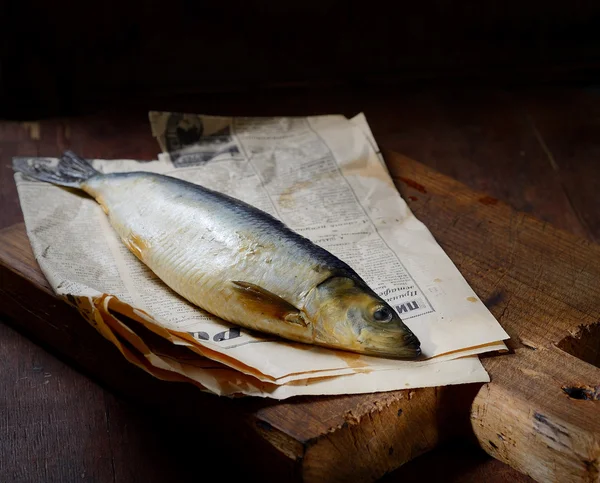 Salted herring on old paper — Stock Image Salted herring on old paper Stock Photo