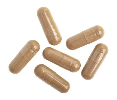 Beyaz arka planda izole edilmiş vitamin kapsülleri, üst görünüm. Sağlık takviyesi