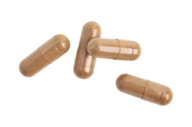 Beyaz arka planda izole edilmiş vitamin kapsülleri, üst görünüm. Sağlık takviyesi