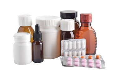 Various pills and medicine bottles on a white background. Concept of healthcare products and medical treatment supplies.