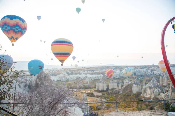 Balloons at dawn in the landscape of cappadocia — Stock Photo, Image