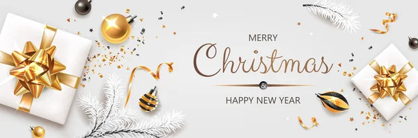 Üzerinde altın ve gümüş Noel sembolleri ve metin olan yatay bir pankart. Noel ağacı, hediyeler, dekorasyon ve beyaz arka planda diğer şenlik unsurları.