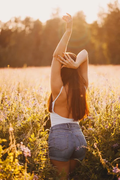 Young Brunette Tank Top Shorts Posing Grass Sunset Background Stock Photo