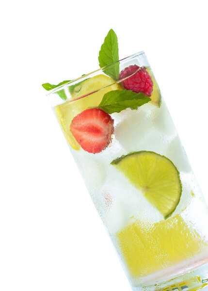 fresh cocktail drink with ice and fruits isolated on white