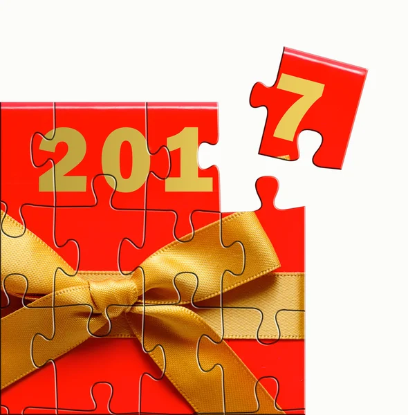 Happy New Year 2017 design concept with red gift box puzzle — Stock Photo, Image