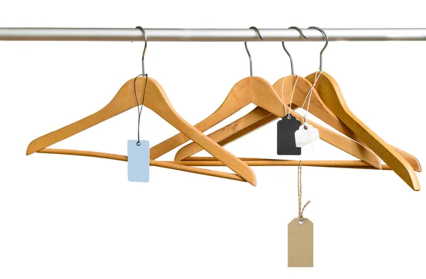 Empty hangers with price tags in the store after sale — Stock Photo, Image