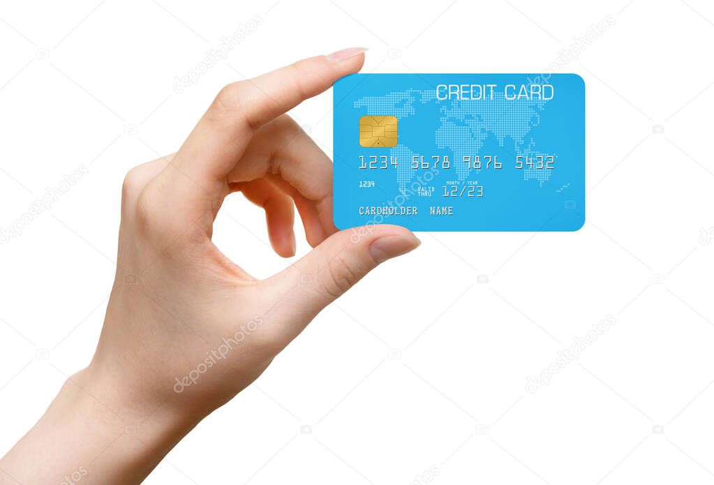 Womans hand holding blue bank card isolated on a white background