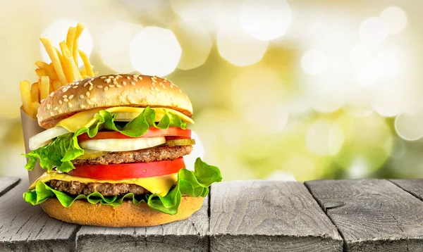 Delicious double tasty burger on the table — Stock Photo, Image