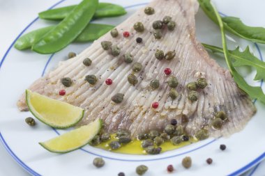 steamed skate wing with Caper Butter clipart