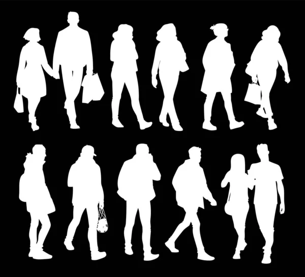 Conjunto de hombres y mujeres jóvenes y adultos de pie y caminando. Ilustración vectorial monocromática de siluetas de personas en diferentes poses. Stencil. Siluetas blancas aisladas sobre fondo negro. Ilustraciones De Stock Sin Royalties Gratis