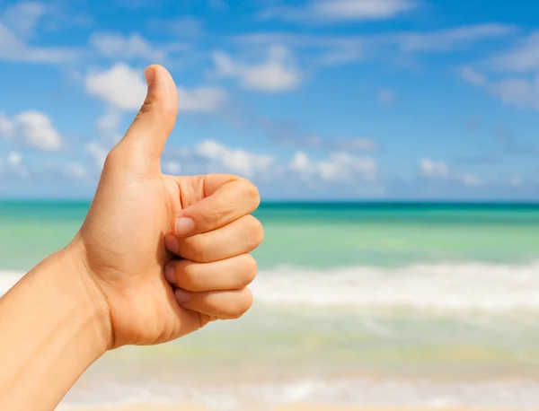 Thumbs up at the beach — Stock Photo, Image