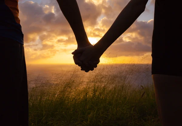 Couple holding hands — Stock Photo, Image