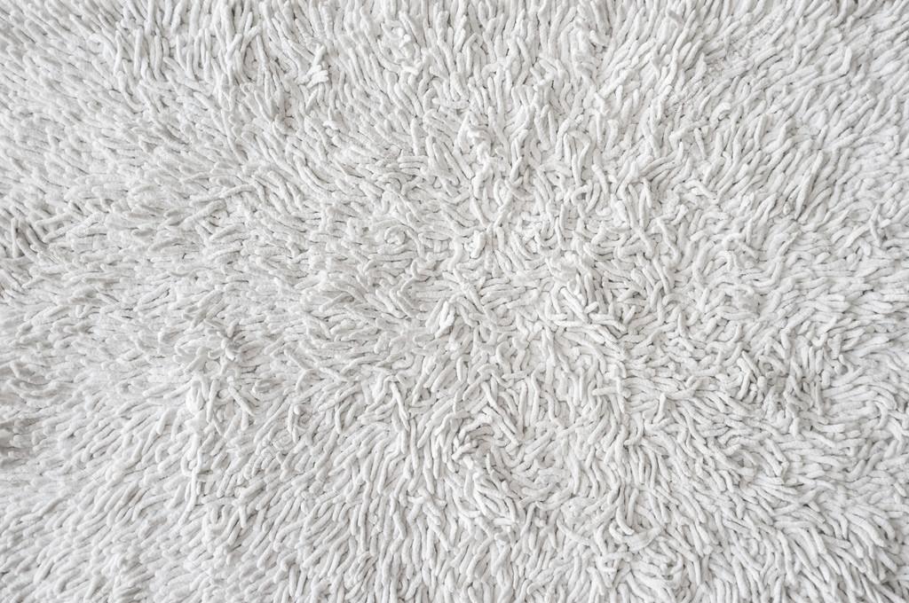 depositphotos_106565604 stock photo white doormat carpet texture background