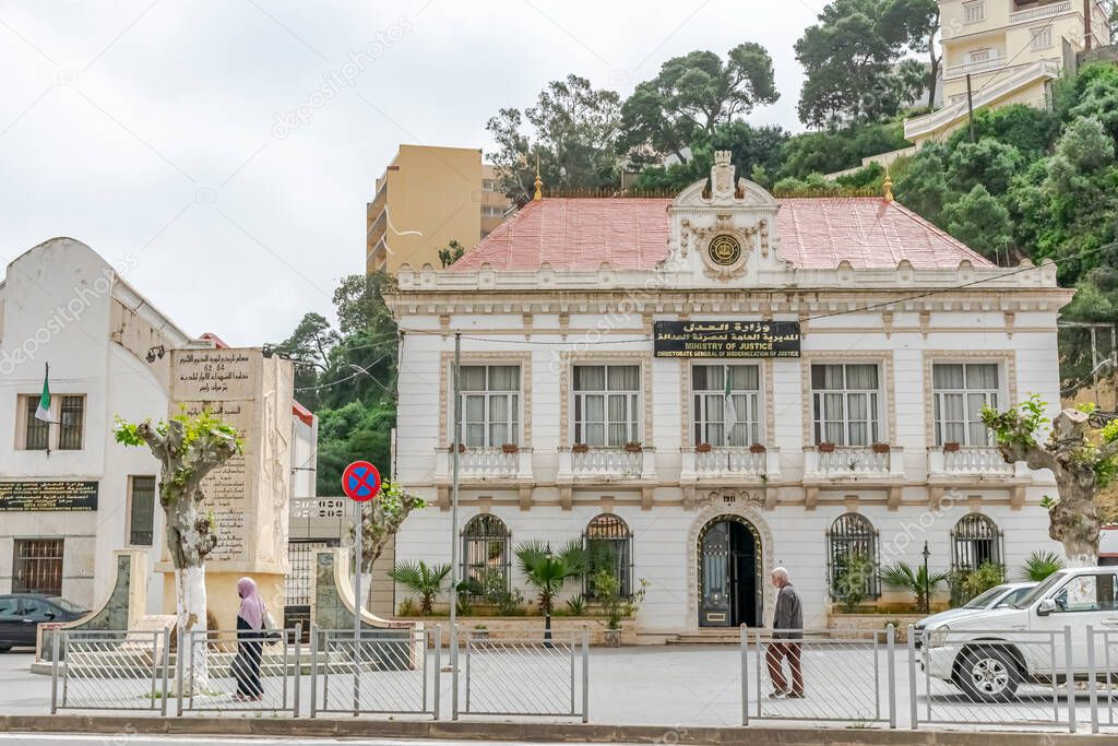 Constantine, Algeria- September 2. 2023: turkish airlines Boeing 737 plane parked in the airport tarmac with people standing in queue to pass the security control before boarding with the airstairs