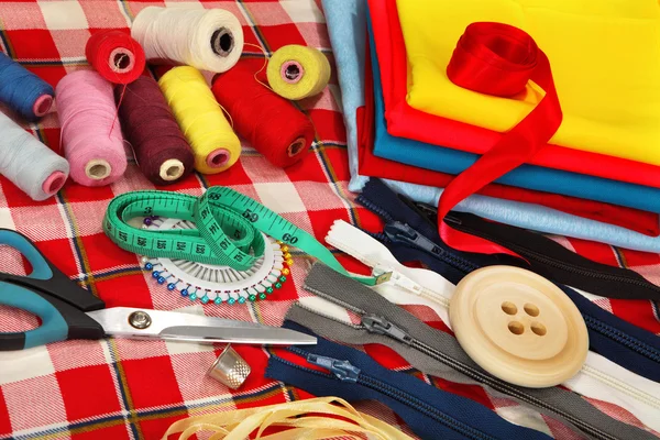 Tailor's tools on bright background