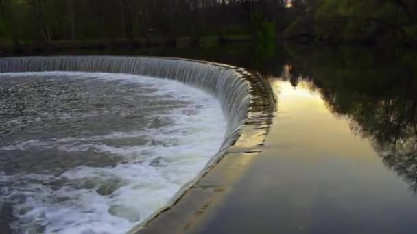 Artificial waterfall on a forest river — Stock Video