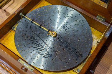 Moscow,Russian Federation - September 23,2017:A metal disk for a musical mechanical machine (music box). Manufactured by Hermann Ritter 1890