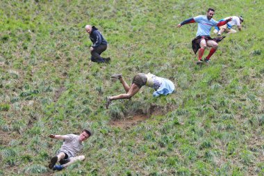 The traditional cheese rolling races in Brockworth, UK.