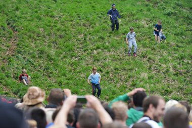 The traditional cheese rolling races in Brockworth, UK.