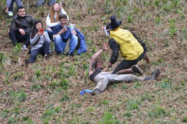 The traditional cheese rolling races in Brockworth, UK.